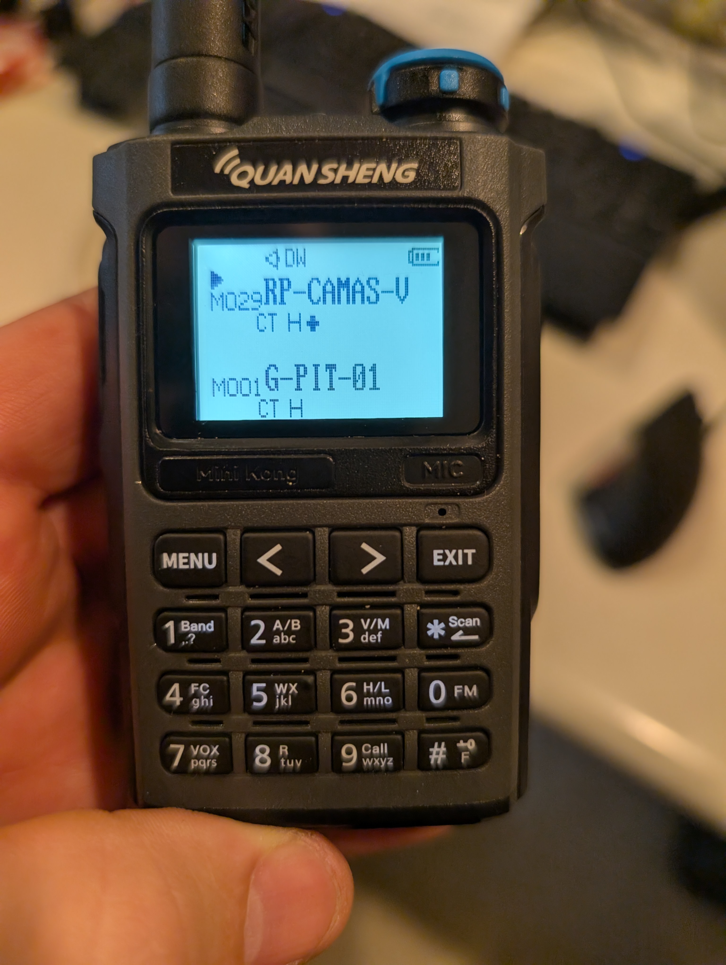A Quansheng UV-K1 OEM UI displaying channel names